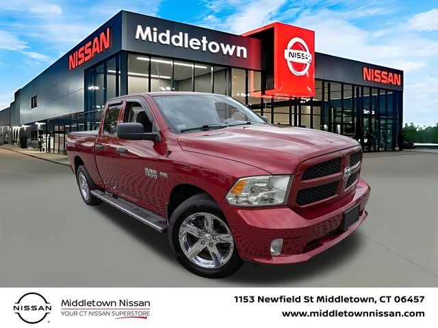 2014 RAM 1500 Express in Deep Cherry Red Crystal Pearlcoat — front three-quarter view