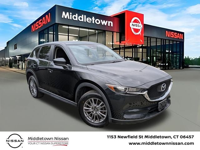 2018 Mazda Mazda CX-5 Sport in Jet Black Mica — front three-quarter view